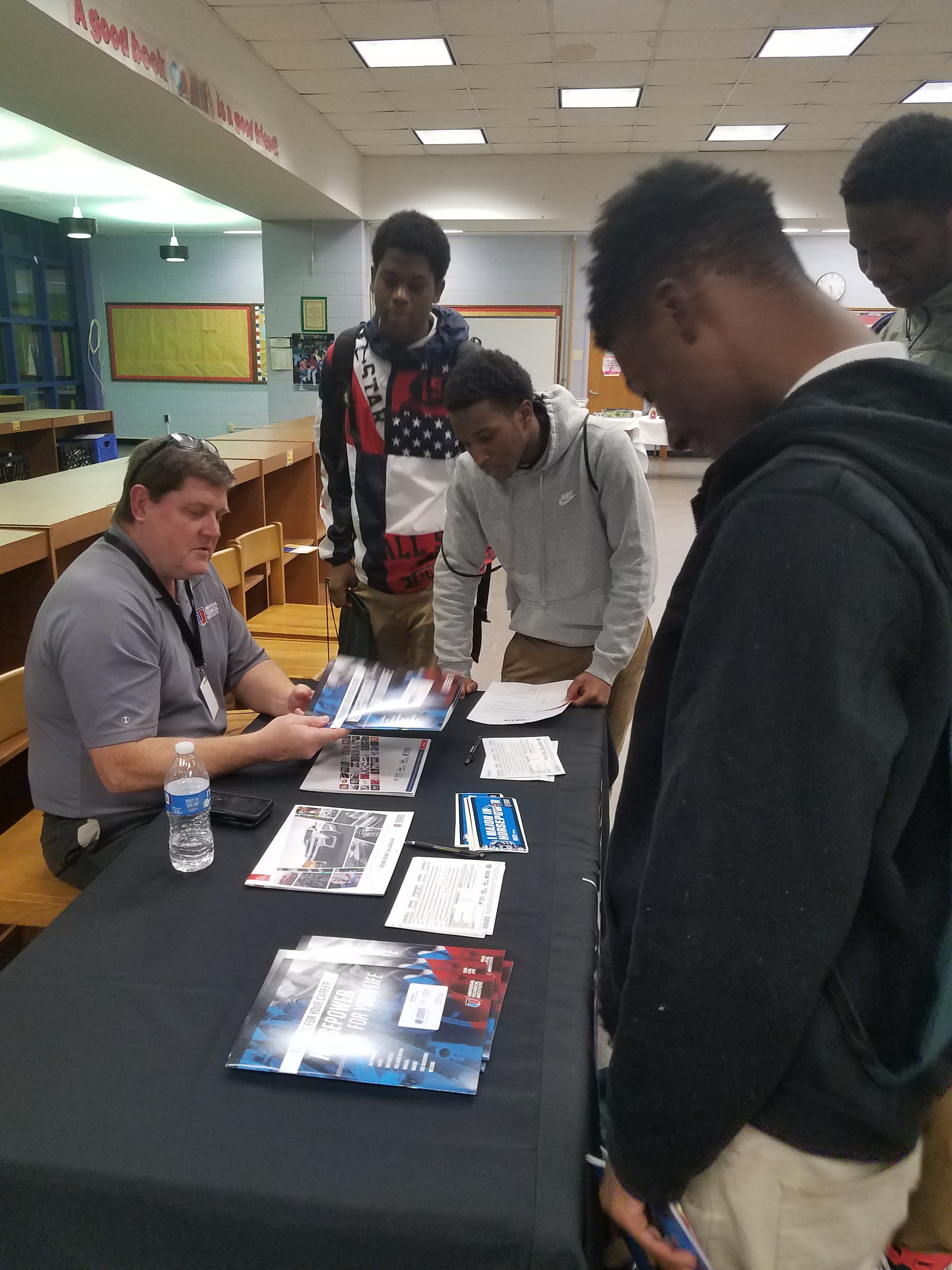 A few BKA students getting information from a career counselor.
